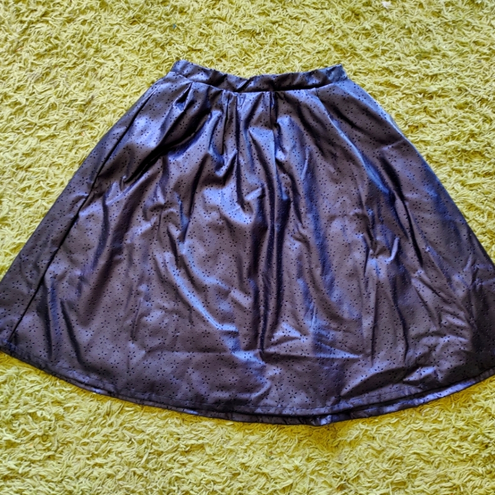 Shabby Apple faux leather a-line skirt with flower cut-outs.